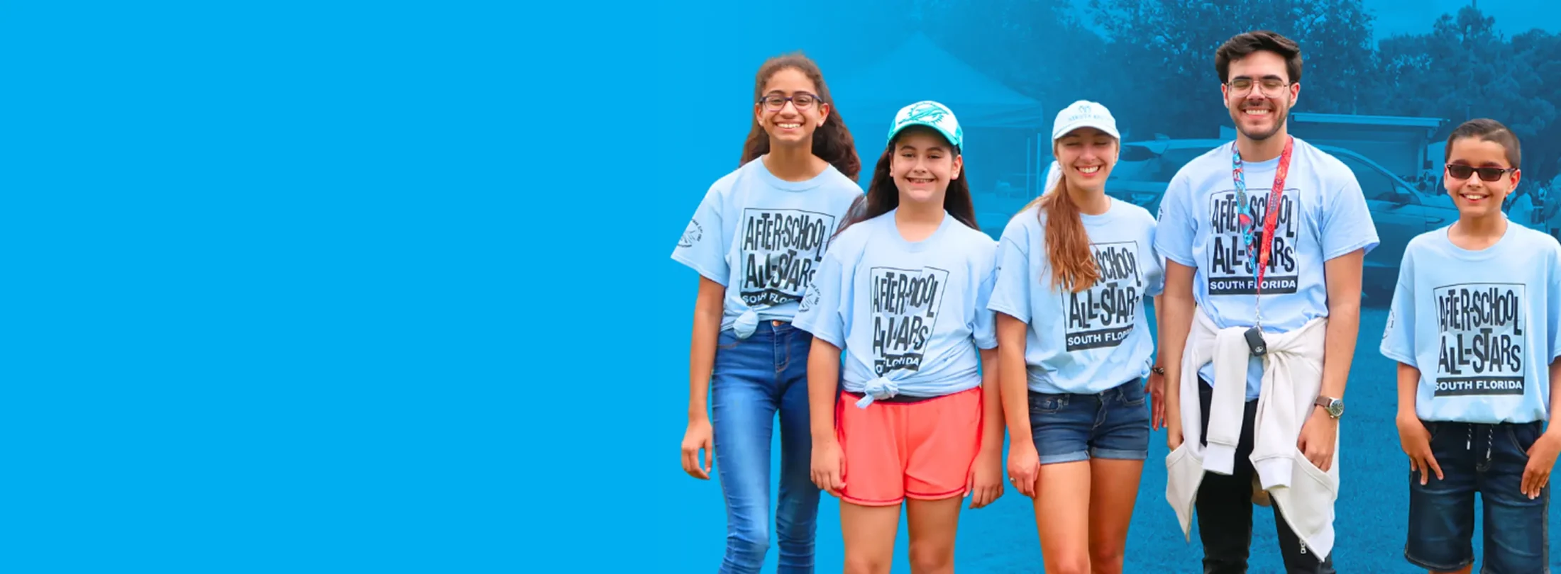 Banner image with group of teenagers wearing light blue After School All Stars shirts